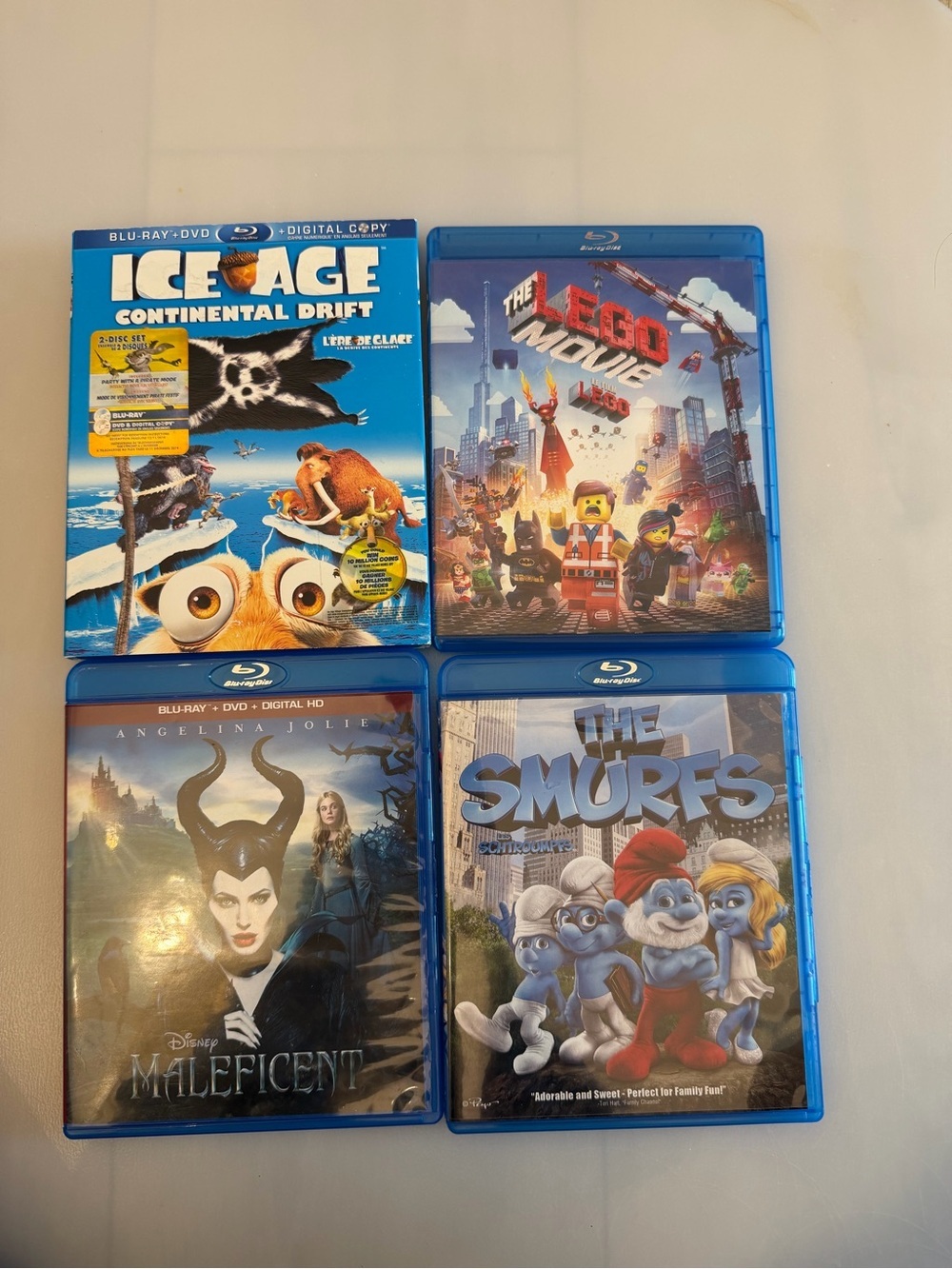 4 Blu-ray Movie Bundle - The Lego Movie, Maleficent, Ice Age & The Smurf